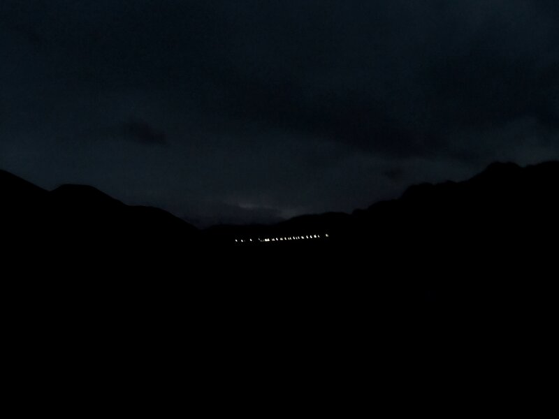 The mysterious lights in the distance simultaneously beckoned and repelled me.