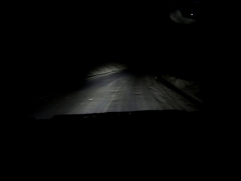 Truck&rsquo;s meager headlight was the only thing that made the empty and harsh road ahead somewhat visible