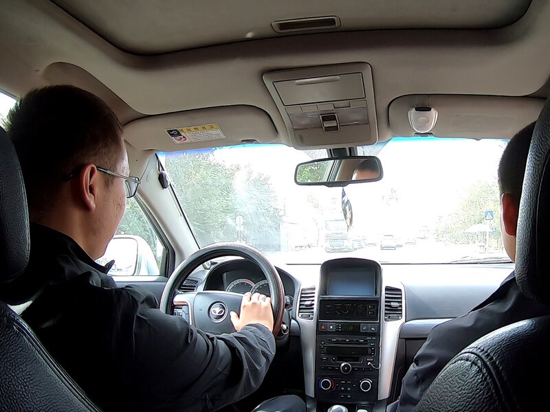 The older brother of Elhan came to drive me to Dostuk.